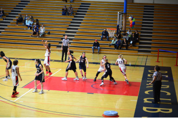 Bear Cubs’ guard Brooke Santander sets 
a screen for SRJC guard Jenna Dunbar.