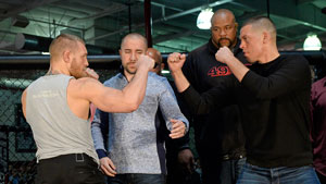 Conor McGregor (left) and Nate Diaz (right) pretend to spar during a press conference before their big fight March. Diaz beat McGregor just as the second round closed.
