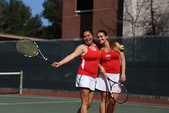 Right: Bear Cub tennis players Betsy Samonte and Coral Imnhoff celebrate their 8-0 victory Feb. 26 against American River College. SRJC women’s is undefeated this season.