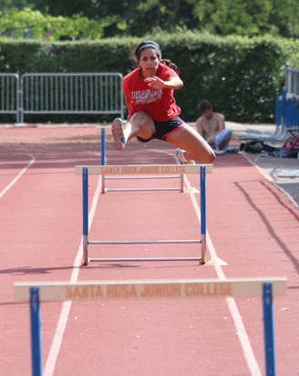 Santa Rosa Junior College track star Stephanie Fernandez practices her 100-meter hurdles at Bailey Field. Fernandez placed 15th out of 28 in the 100-meter hurdles with a time of 16.78.