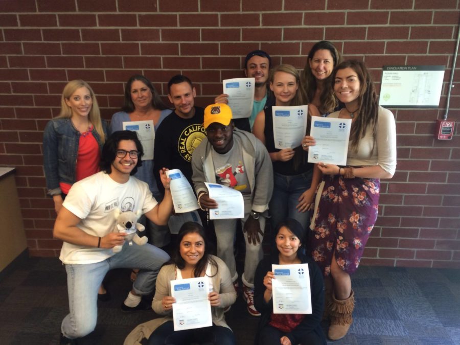 PEERS members and students display their Mental Health First Aid certificates.