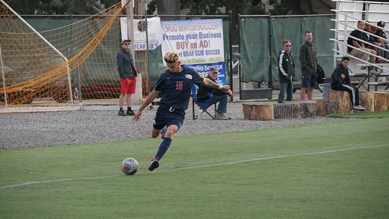 SRJC forward Wilson Briggs attempts to save the ball before it goes out of bounds on Sept. 30.