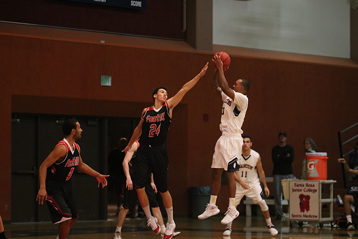 Freshman point guard Justin Frazier pulls up and makes a mid-range jumper in SRJCs 91-84 overtime victory over Foothill College on Nov. 11 at Haehl Pavilion.