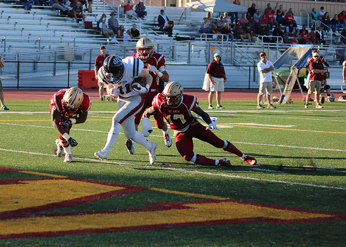 SRJC sophomore wide receiver Ben Putman fights through multiple tackles and falls into the end zone to score one of seven receiving touchdowns for the Bear Cubs in their 53-30 win on Nov. 12. 