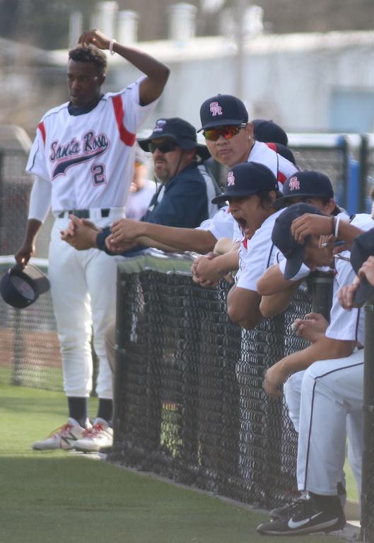 Outfielder Benjamin Pigg and members of the Santa Rosa Junior College baseball team look on during game two of the Sac City Series.