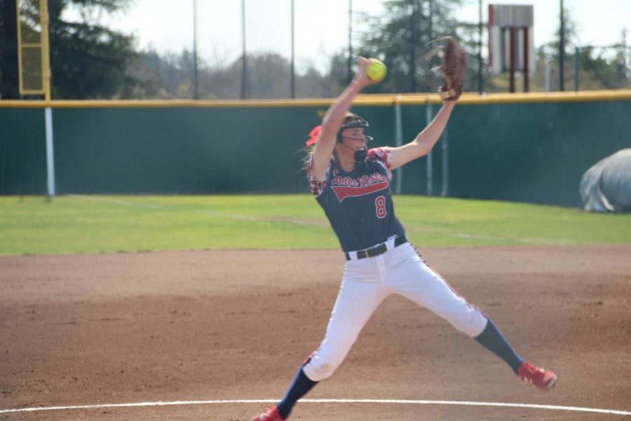 Sophomore pitcher Cailyn Callison winds up for a pitch to a Sierra College batter.