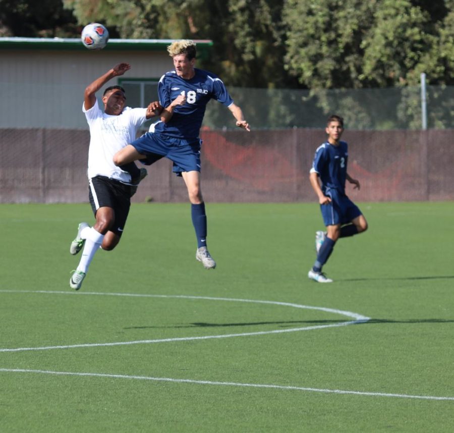 Freshmen defender Logan Zimmer leaps high to stop a ball heading towards the Bear Cubs net in Santa Rosa Junior Colleges 1-0 win over Napa Valley College on Sept. 14 at Cypher Cook Field.