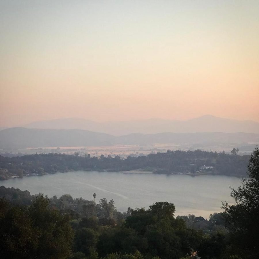 Smoke lies thick over Hidden Valley Lake, CA. Photo by David Andersen, @davidxandersen.