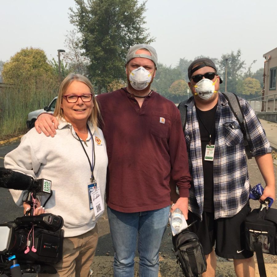 Roberta MacIntyre, James Wyatt and Albert Gregory don their N95 masks to travel bravely into the fire zones and capture footage. PC  Oak Leaf Staff