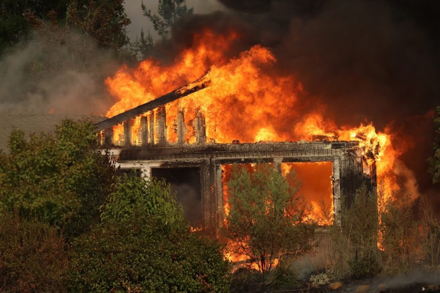 Over 60 active fires continue to destroy buildings, Oct. 9, in Santa Rosa like this house on Deer Park Lane. 