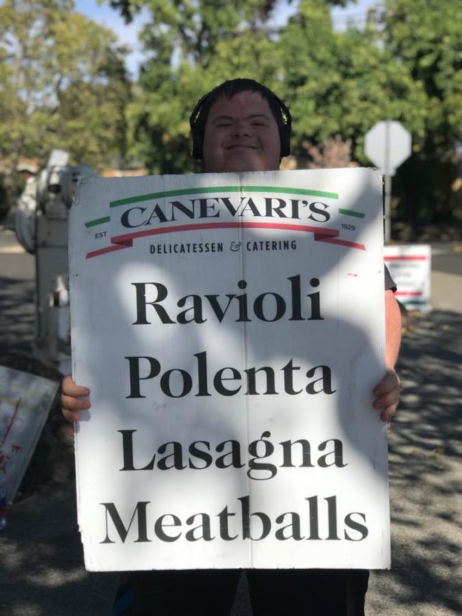 Chadwick Tatum, 30, is one of three sign spinners employed at Canevaris Deli in Santa Rosa.