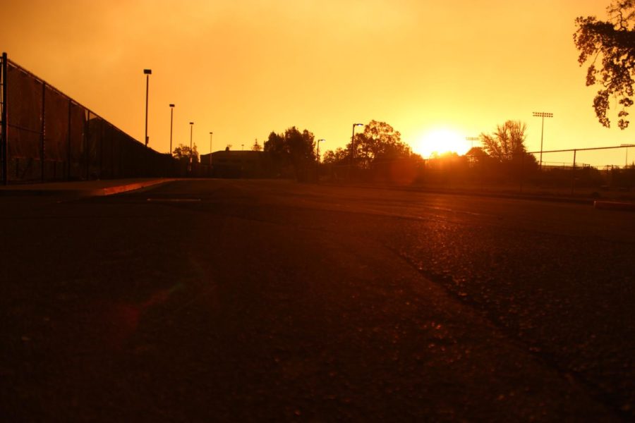 The sun rises over a smoky sky at SRJC on Monday Oct. 9.