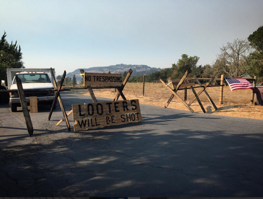 A sign warns looters in Sonoma County