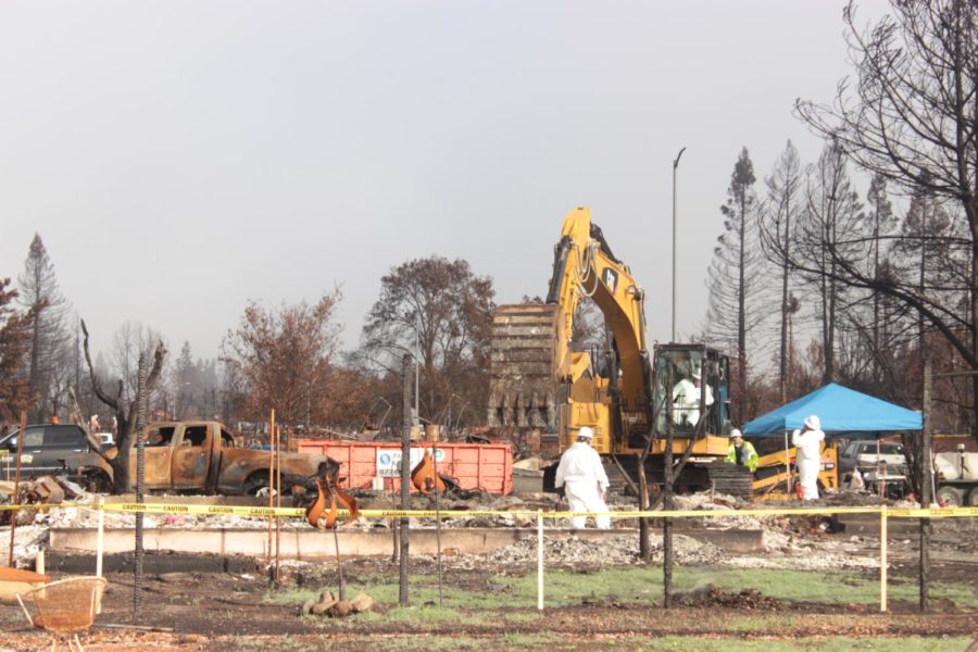 Clean-up crews use heavy machinery at Coffey Park Nov. 14. 