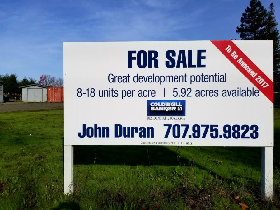 A real estate sign on Sebastopol Road, touting the recent annexation of Roseland as a selling point.