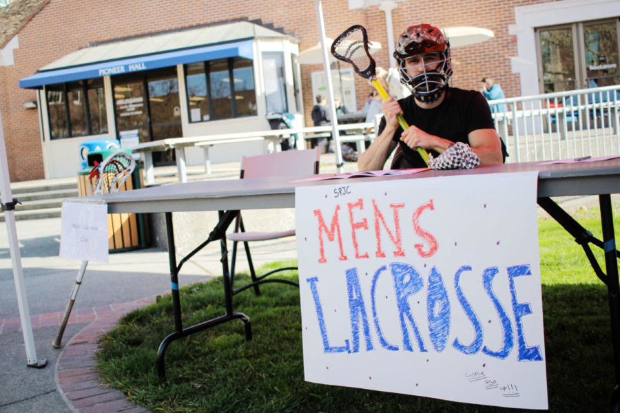 Making a debut appearance at club day, kinesiology major Maxwell Bernadini-Jaurique recruits students for lacrosse club. While originally recruiting men, Bernadini-Jaurique also started a second roster for women.