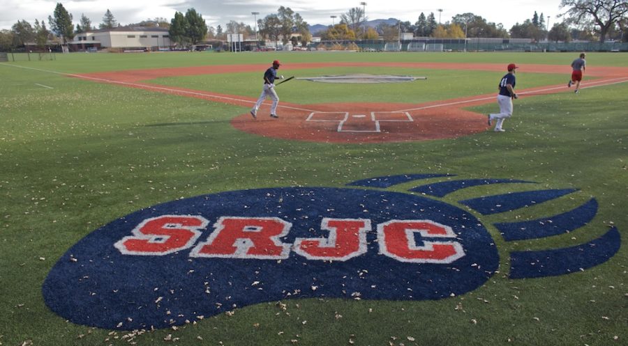 SRJC baseball players sprint across the diamond.