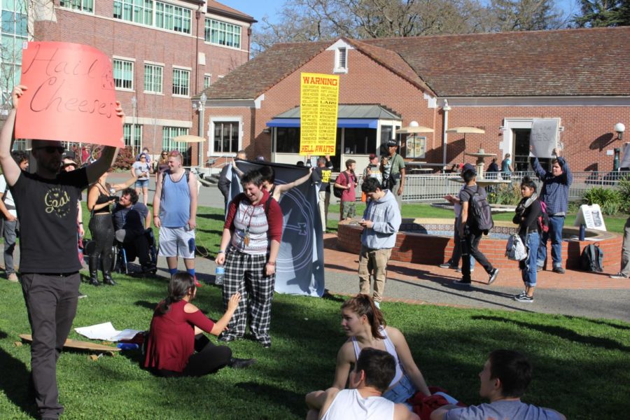 Demonstrators preach hard-lined Christian dogma and warn students and counter-protesters of Gods coming wrath.