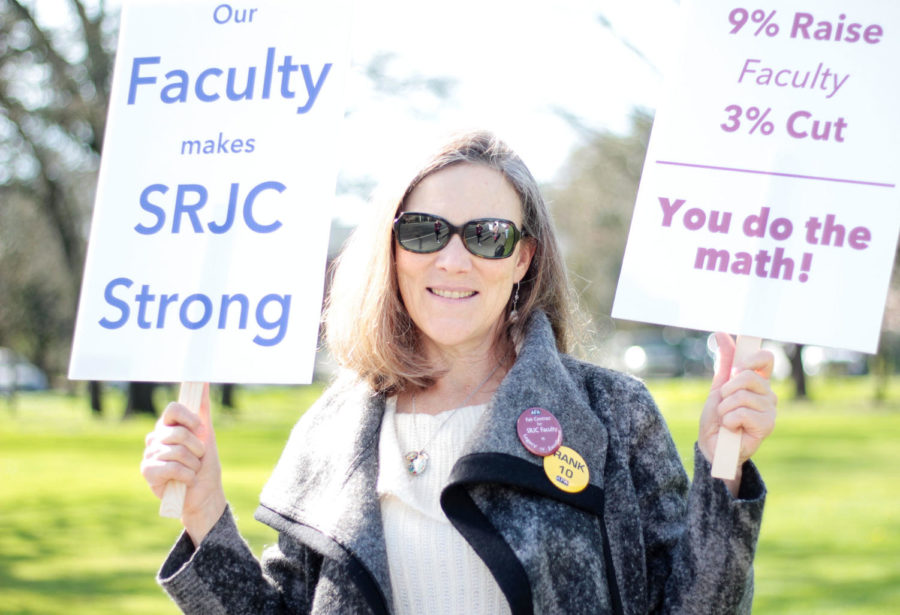 Chief AFA Negotiator Julie Thompson protests the unfair salary wages for faculty and staff on Mendocino Avenue.