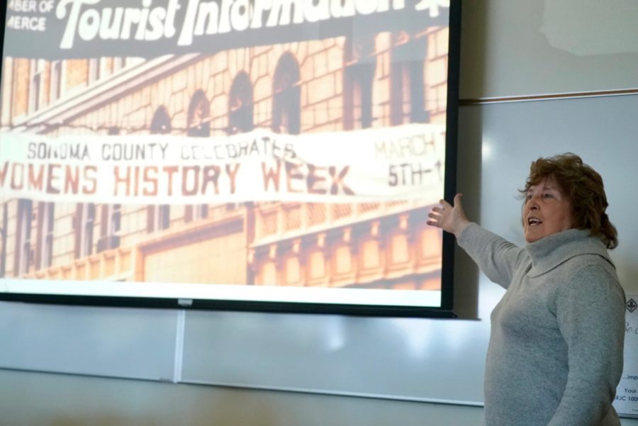 Molly McGregor presents a slideshow of images from the first Women's History Week in 1978 to students on Monday March 5. Photo by Rachel Edelstein.