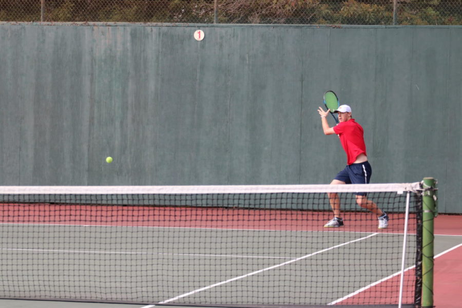 Second-year Trevor Pinder winds up for a rocket during his match Thursday.