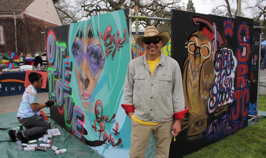 Artist Martin Zuniga takes a break from screen printing to pose in front of his traveling art exhibit at SRJCs One Love Diversity Festival.

“Since the market crash in 2008, it has been really tough for us artists. I started ‘Quebo,’ which means, ‘What’s up?’ to take the art into the community. We bring it to schools or different events to make sure art gets to the people,” said Zuniga. Photos by Adeira Sherpa.