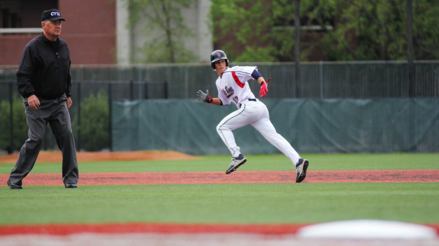 First-year infielder Hance Smith runs to third base after stealing second base in the fourth inning against Consumnes River on April 4 at Bailey field.