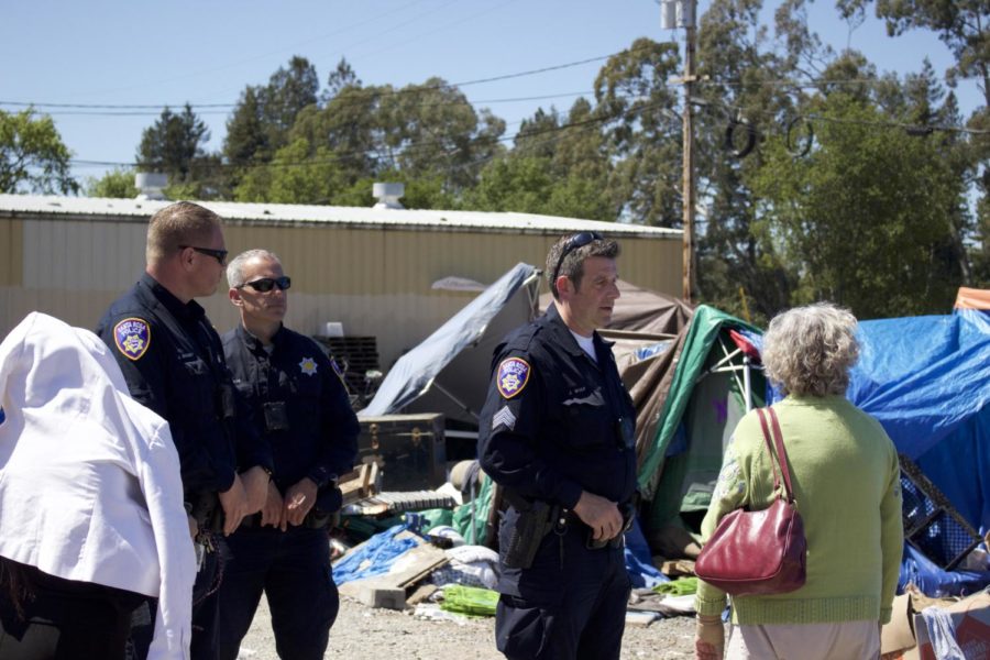Santa Rosa police oversee the final stages of shutting down the 'Camp Macaela" homeless encampment behind the Dollar Tree in Roseland. Sonoma County officials need the area cleared to begin development of an affordable housing project.