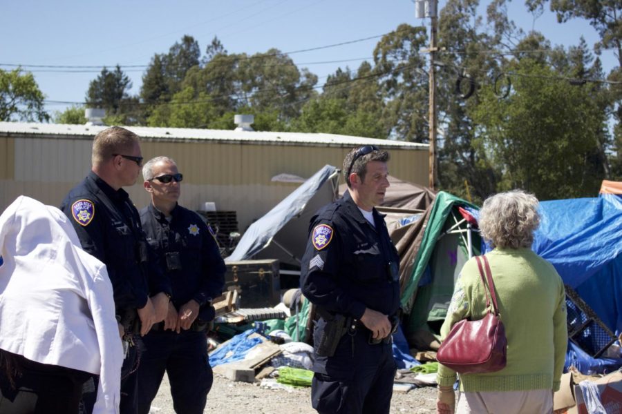 Santa Rosa police oversee the final stages of shutting down the Camp Macaela homeless encampment behind the Dollar Tree in Roseland. Sonoma County officials need the area cleared to begin development of an affordable housing project.