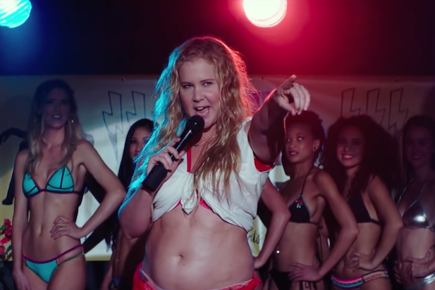 Amy Schumer performs on stage during a scene in her new movie, I Feel Pretty.