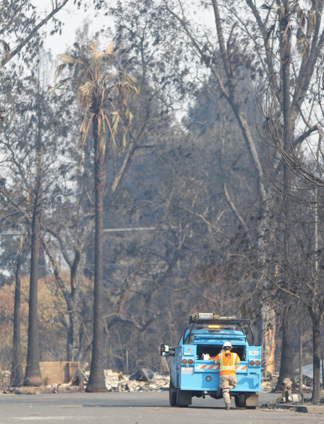 Pacific Gas and Electric (PG&E) removes lethal electrical wiring in Coffey Park during the October wildfires that devastated Sonoma County.