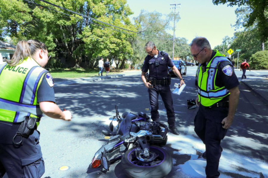 Officers try to read the Yamaha motorcycles vin number but its nearly unidentifiable post accident on Elliott Avenue. The rider was rushed to the hospital; his condition is unknown.
