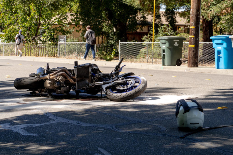 Yamaha motorcycle collided with a minivan on Elliot Avenue, with front suspension bent.