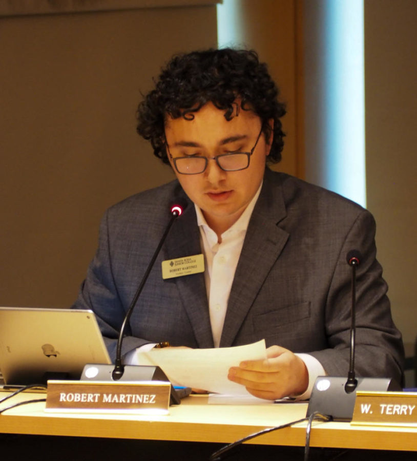 Student Trustee Robert Martinez reads his plans for the newly-formed Student Trustee Advisory Group