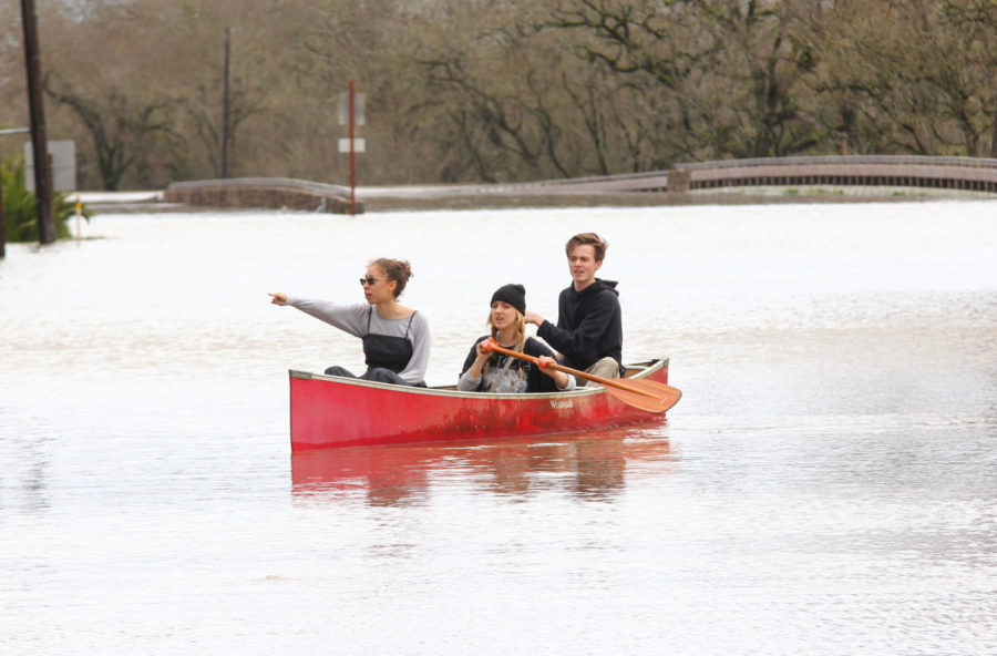 Students from Analy High school brought a canoe to explore the flooded areas of Sebastopol after school was cancelled the previous day.