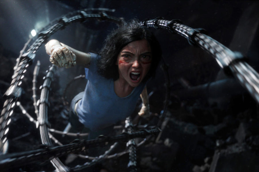 Alita (Rosie Salazar) diving into action in Alita: Battle Angel.