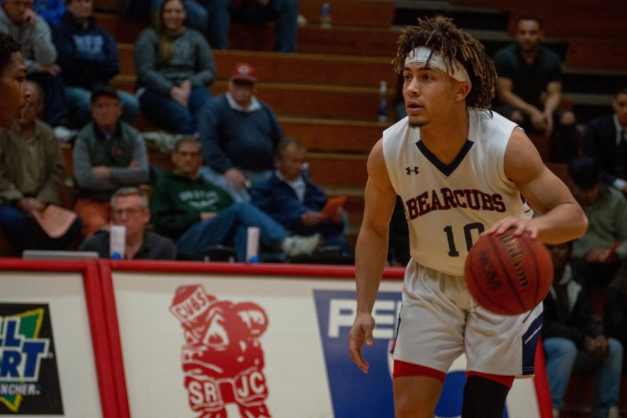 Santa Rosa Junior College's freshman guard Damian Wallace drives down the court in the Bear Cubs 91-77 win over Consumnes River College on Feb. 8. Wallace has averaged 7.7 points along with 6.2 assists per game this season.