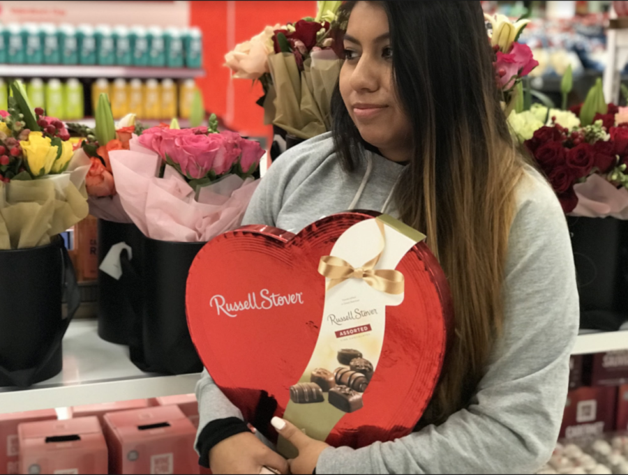 Santa Rosa resident Jasmine Rosas buys herself a box of chocolates for Valentines Day.