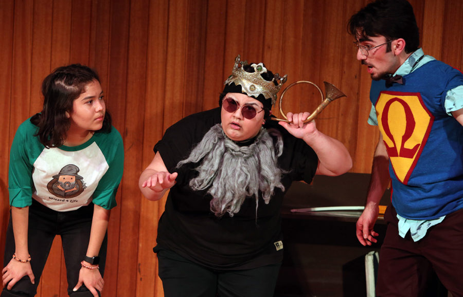 Jasmine Flores-Nunez(left), Alexx Valdez(middle) and Christopher Shayota(right) play a student teacher, high school coach and theater professor whose job is to help a group of high school students, the audience, graduate.
