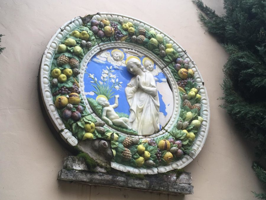 The piece adorning the wall was brought in from Italy and is now featured at the Chapel of Chimes in Santa Rosa. The fountain seeks to evoke a Renaissance Fresco style. 