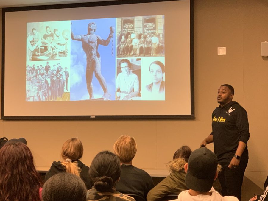 SRJC Umoja and Student Success program cordinator, Byron Reaves, explains the deep connections between hip-hop and the voice of black America in his presentation "It Was All a Dream," Tuesday afternoon in the Bertolini Student Center.