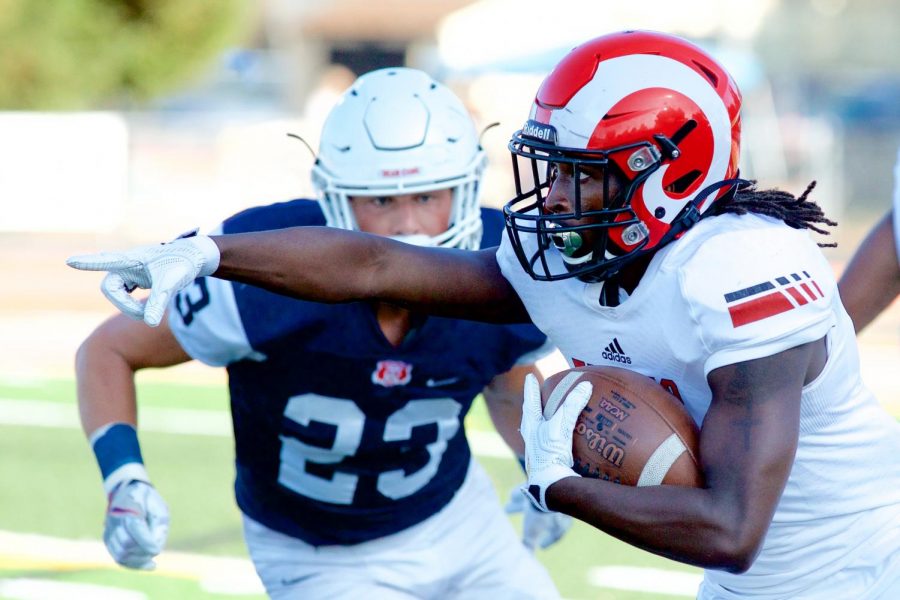 Fresno City wide receiver Michael Gates (3) directs traffic down field after a reception in the 2019 season opener at the Santa Rosa High School football field September 7 in Santa Rosa.