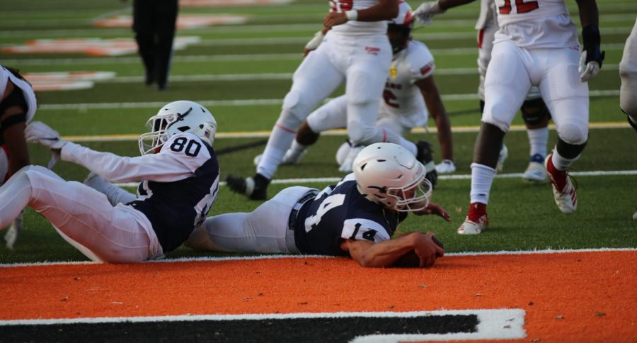 SRJC quarterback Will Heckman scores one of his two touchdowns during the Bear Cubs home opener Saturday. SRJC fell to Fresno College 35-17. 