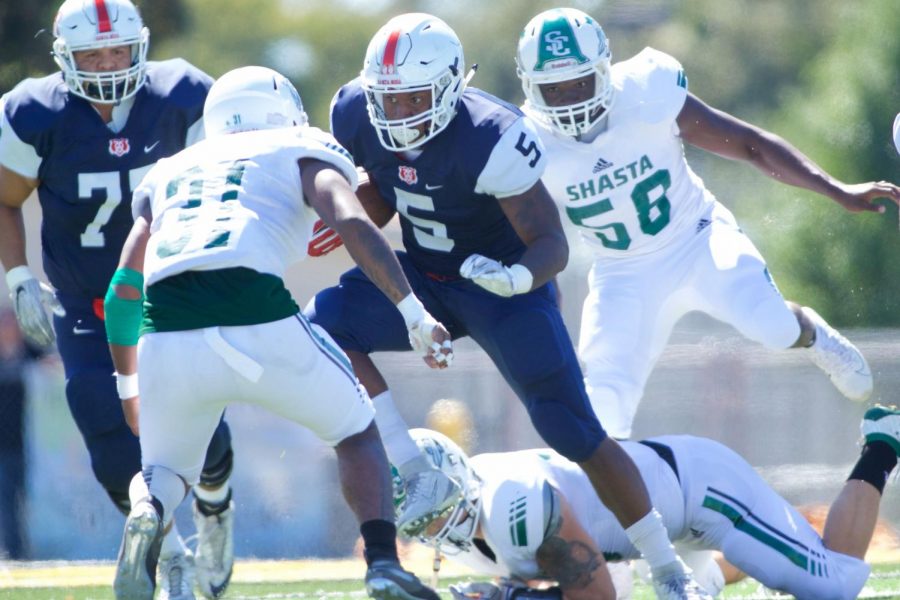 SRJC running back Maceo Barbosa evades a Shasta College defender during the Bear Cubs Sept. 21 game. SRJC suffered a tough 24-17 loss.