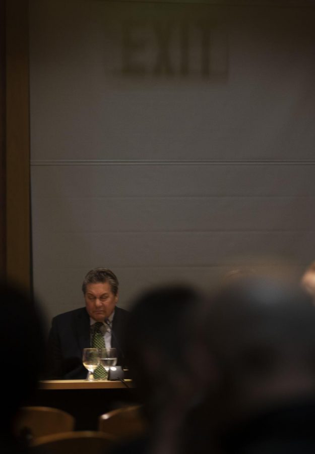 Trustee Don Edgar battles sleep during Tuesday's Board of Trustees meeting.