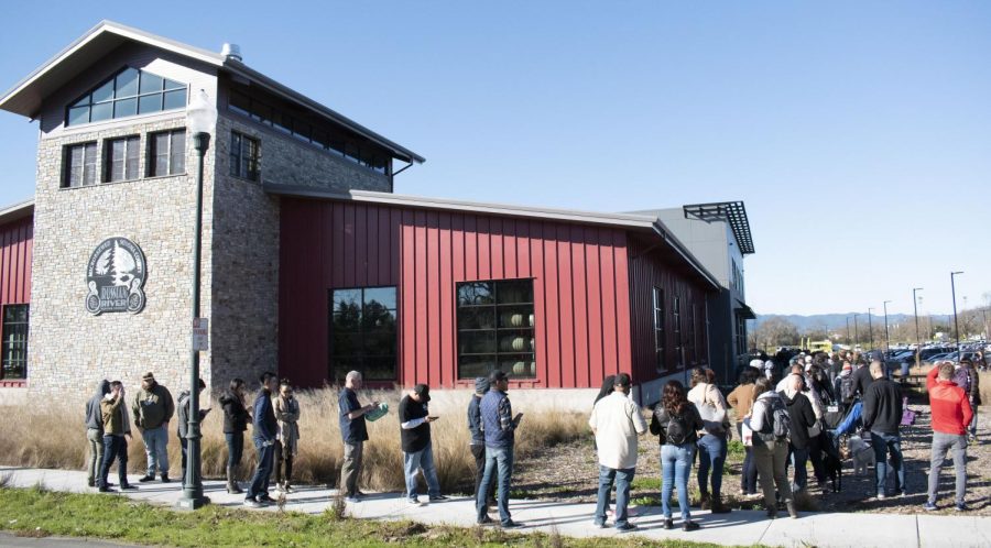 Hundreds of eager beer drinkers line up outside the Russian River Brewing Company's (RRBC) headquarters in anticipation of the brewery's annual release of their world-famous Pliny the Younger beer, Feb. 7 in Windsor.
