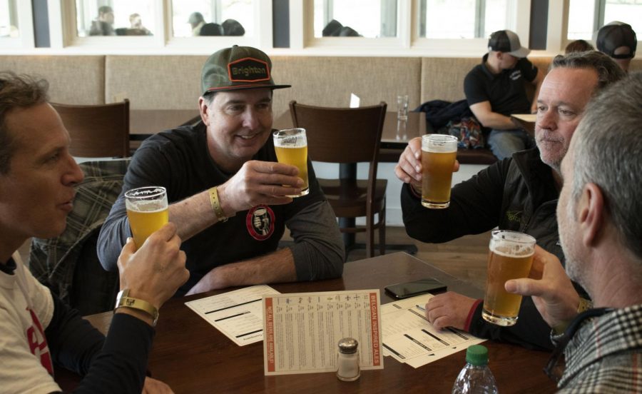Four Pliny the Younger fans from San Diego — (left to right) David Murphy, Scott Humphry, Scott Stephenson and Jason Duhn — celebrate their first sips of the world-renowned beer Feb. 7 at the Windsor RRBC. The group has been drinking the beer for several years at Haven Gastro Pub, a small bar in Orange, California, but this year they journeyed to the source for Murphy's 50th birthday.
