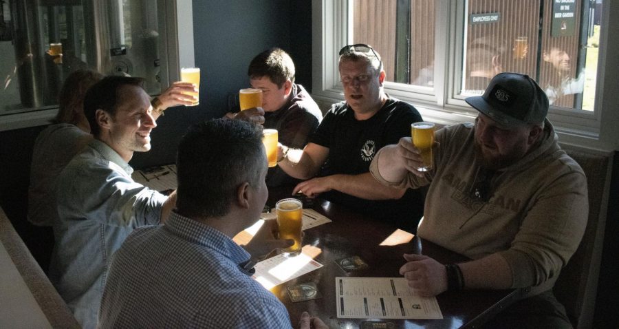 A group of German beer enthusiasts raise their first-ever glasses of Pliny the Younger.