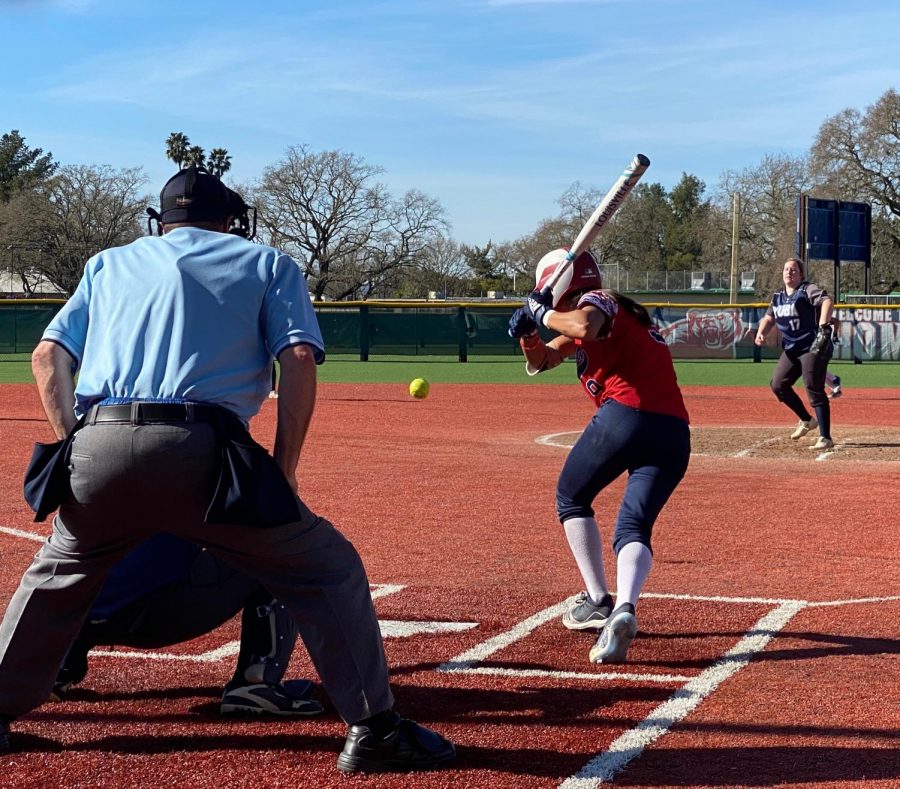 Bear Cubs left-handed slapper Anna Zoia-Buescher hits the ball to left field for a base hit in a 17-0 home victory Feb. 25 at Santa Rosa Junior College. 