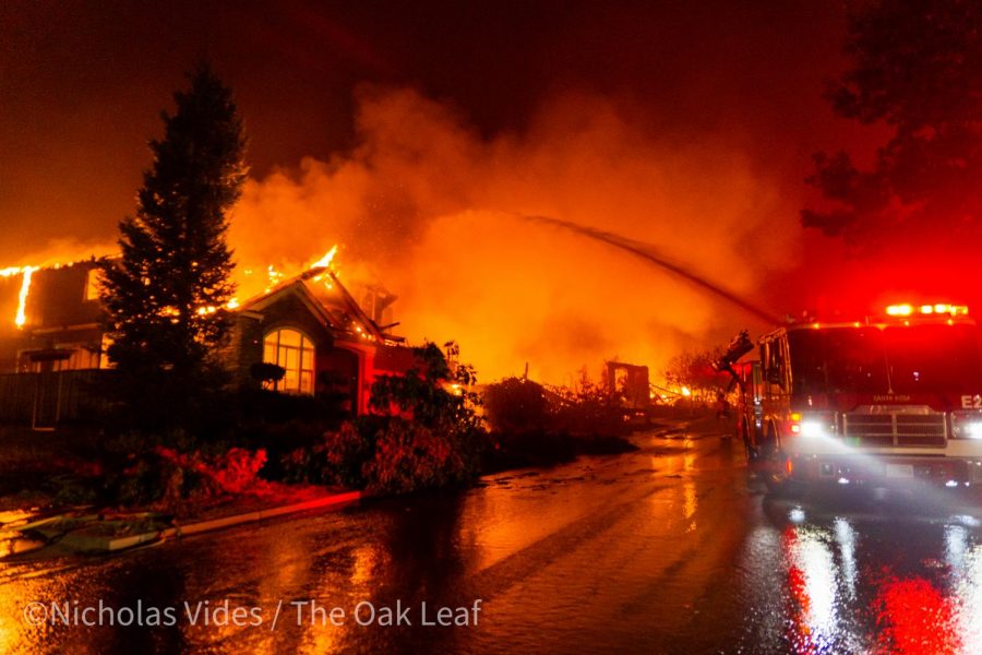 Firefighters on Mountain Hawk Road fight devastating flames as the Shady Fire moves in on eastern Santa Rosa early Monday morning.